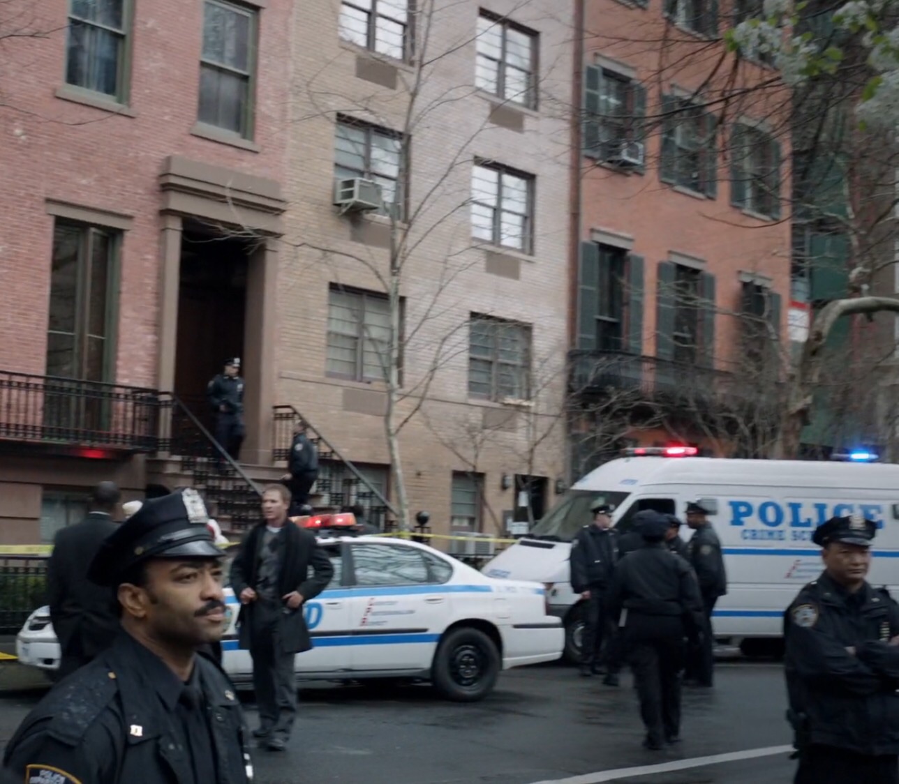 NYPD Officer at the crime scene. -'Elementary' show. s1e1