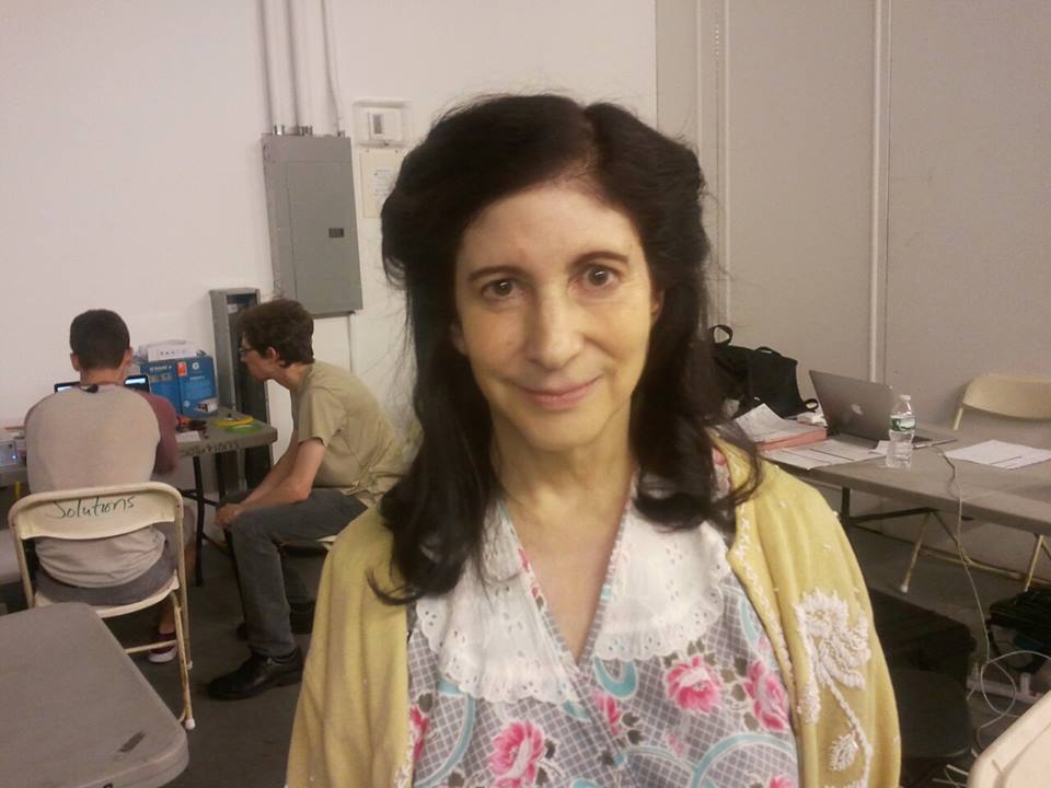 Elisa London in costume awaiting makeup for the role of Sam's Mom in the feature 