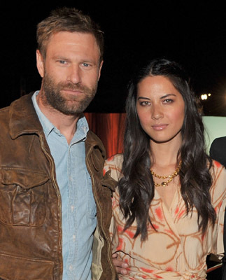 Aaron Eckhart and Olivia Munn