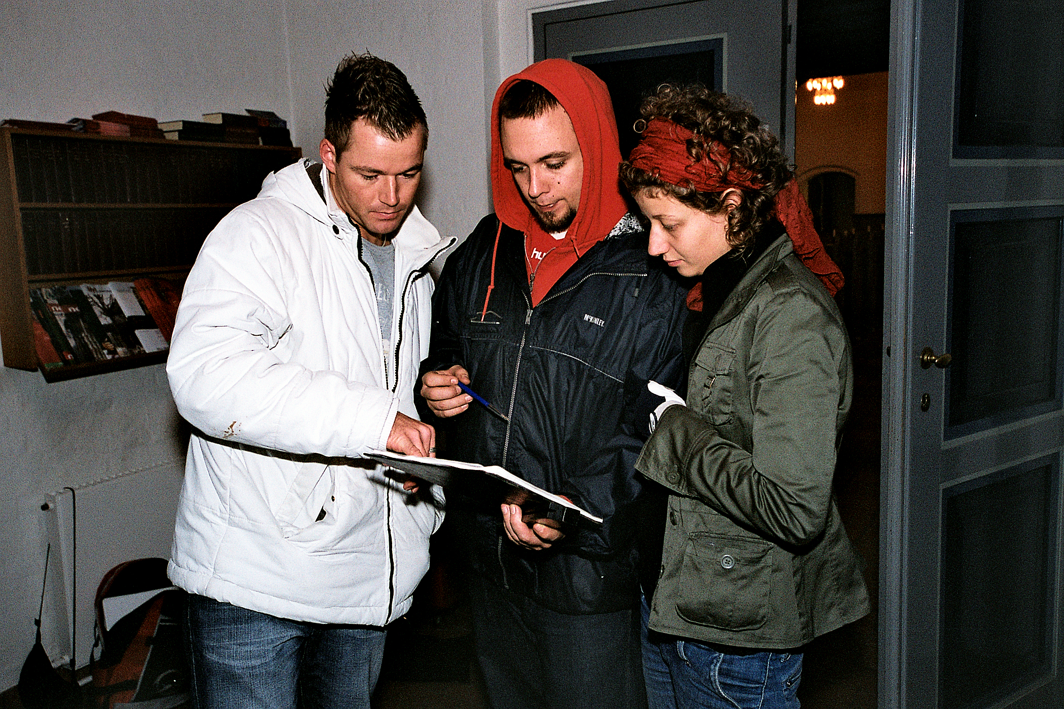 Anders Helde with 1st AD and cinematographer on the set of 'Kirken' 2006.