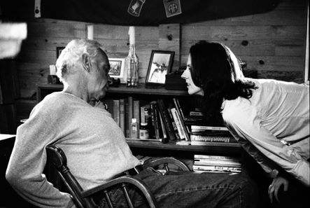 Kristina Hughes with Bruce Peterson in the Walker Cabin GREEN RIVER.