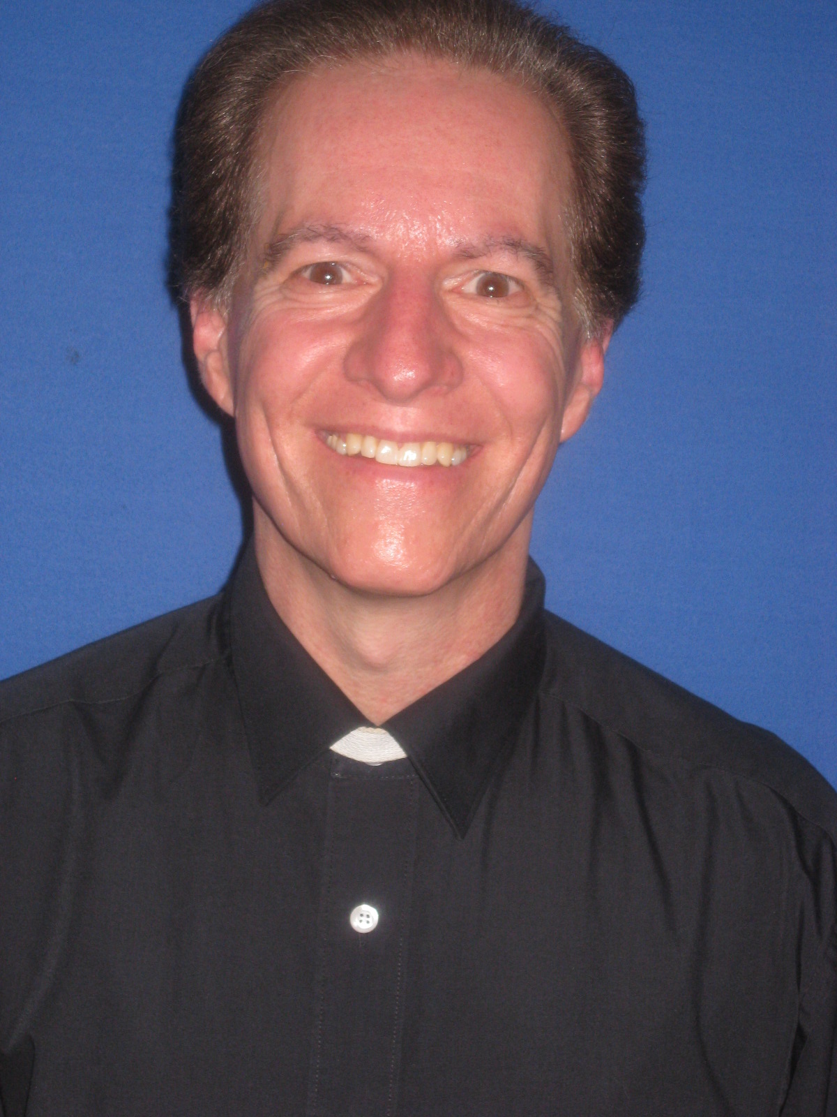 Art Roberts as Father Paul