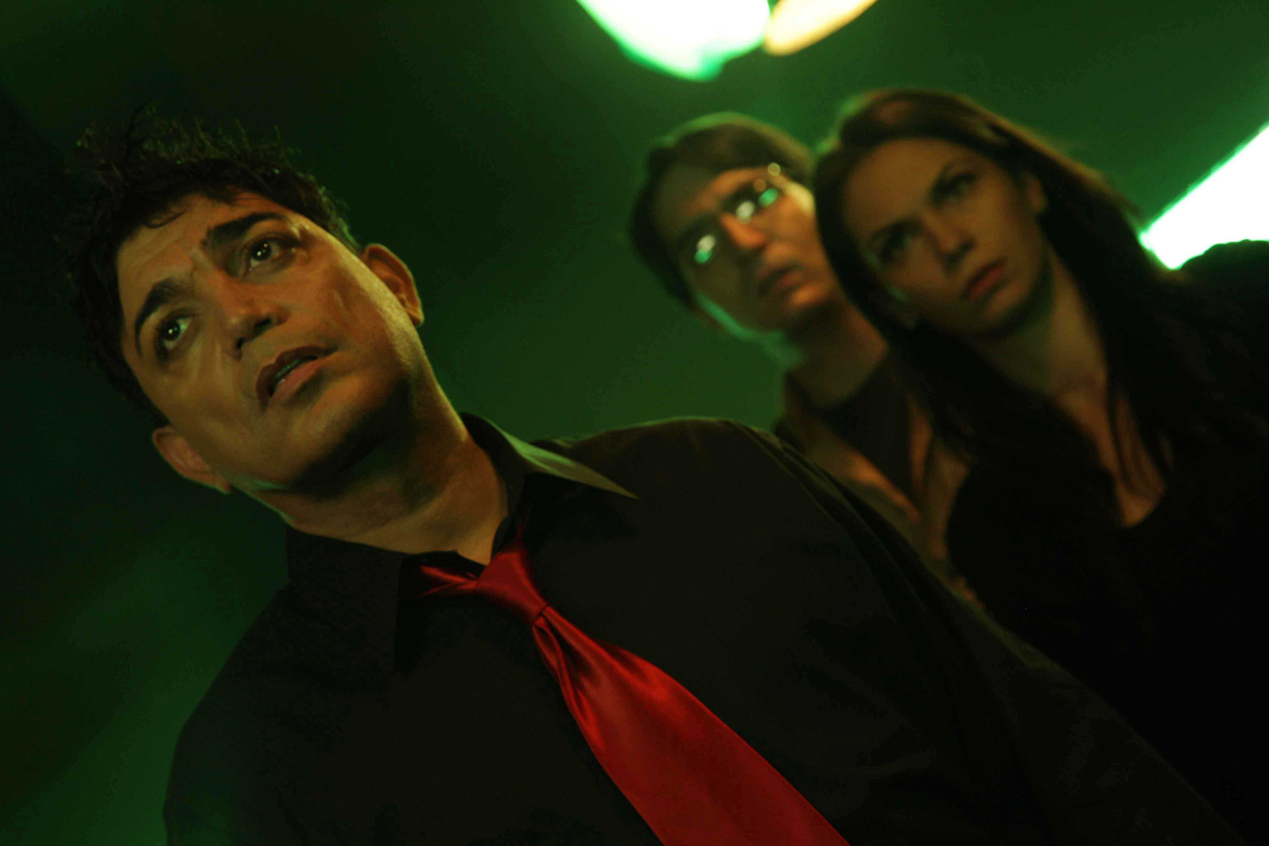 Michael DeLorenzo, Katerina Kopel and David Dastmalchian in The Employer (2013)