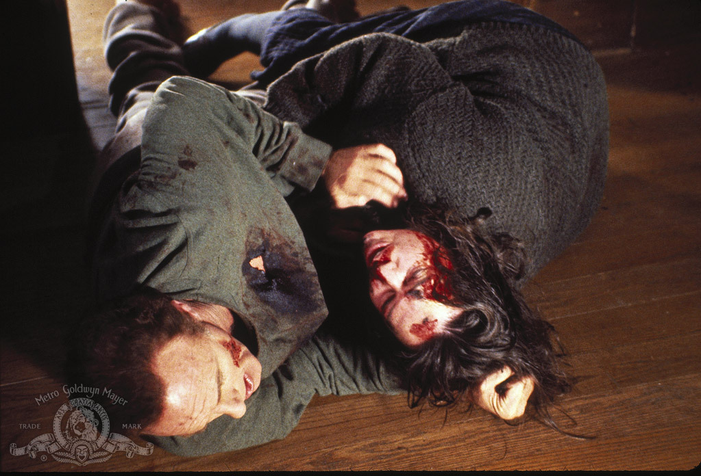 Still of Kathy Bates and James Caan in Misery (1990)