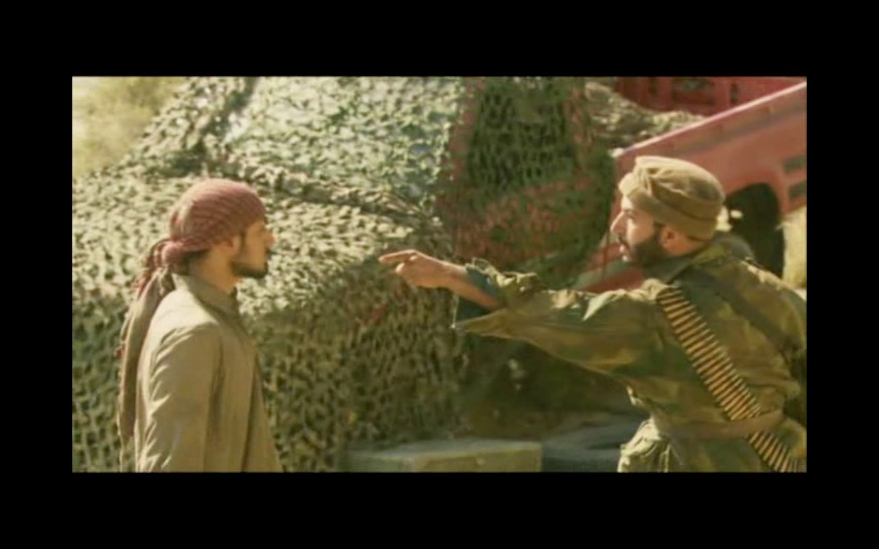 Screen shot of Waleed Elgadi with Riz Ahmed in Four Lions