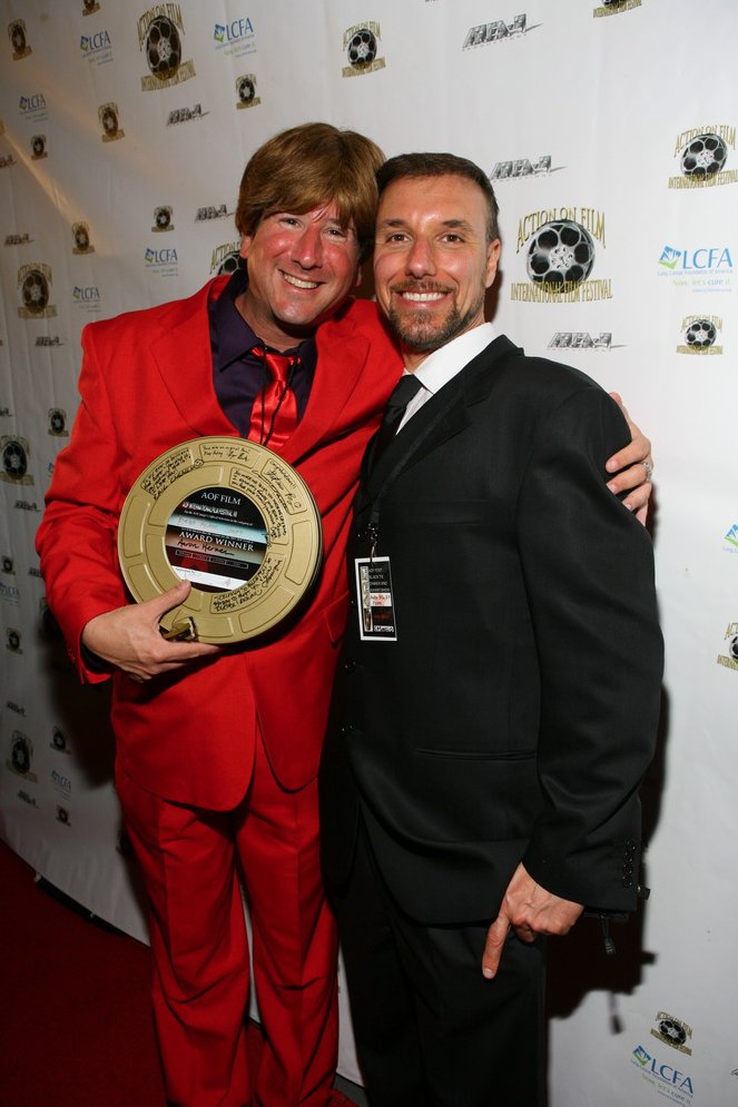 Aaron Merken with Eric Casaccio accepting the Best Actor in a Short Award at the Action On Film International Film Festival representing 