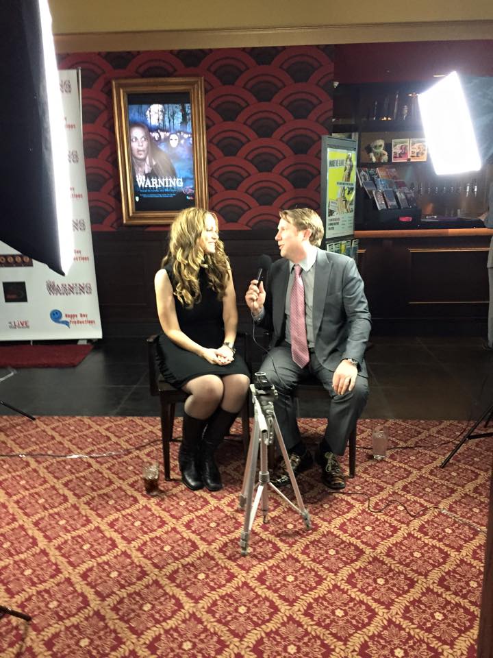 Summer Moore being interviewed at the Colorado Premiere of The Warning