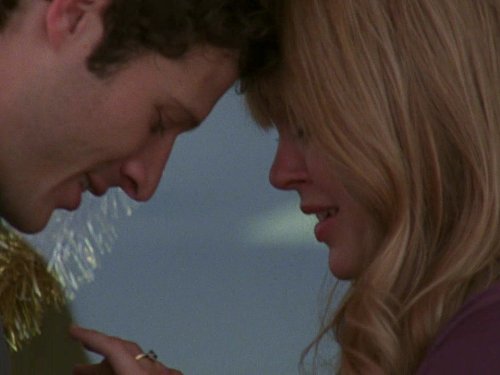 Still of Zach Gilford and Aimee Teegarden in Friday Night Lights (2006)