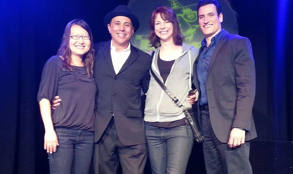 Tommy T onstage with Michael Vitiello from the Guidos of Comedy, Diane Neal from Law & Order SVU, and comedian Helen Hong.