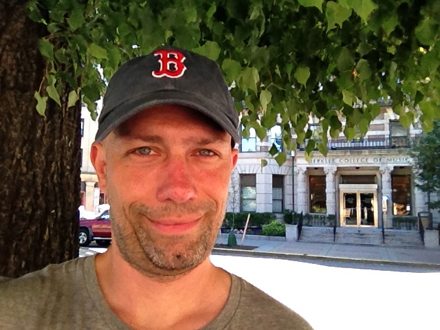 Robert Jisa in front of his alma mater, Berklee College Of Music.