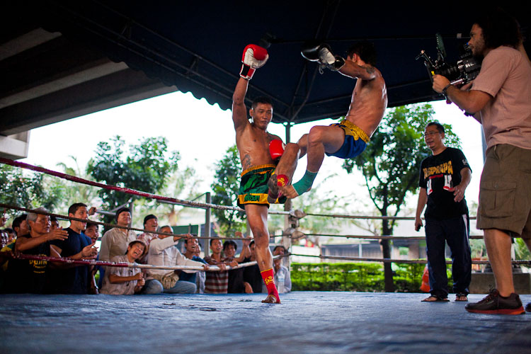 Shooting on Location Muay Thai fighting, Bankok, Thailand. Anything for the shot!