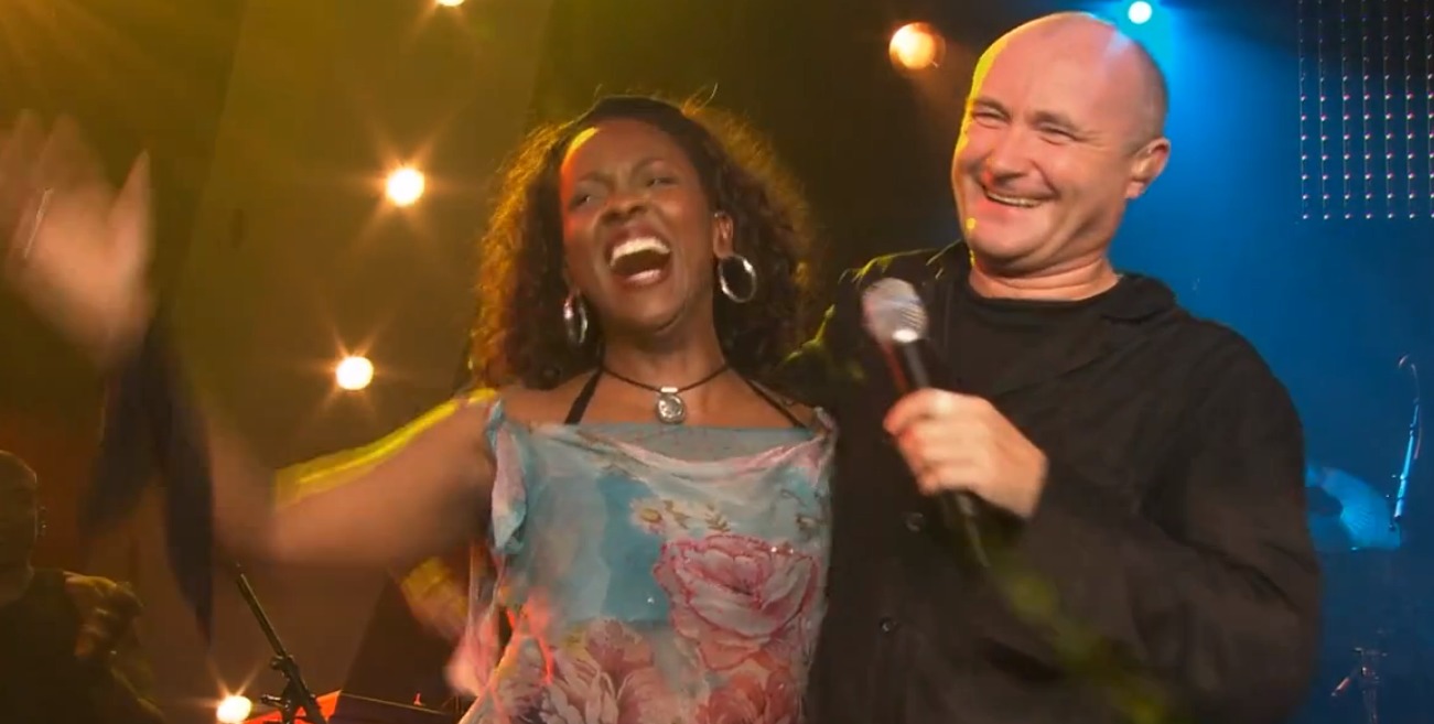 Phil Collins introduces Connie Jackson for final bows during 