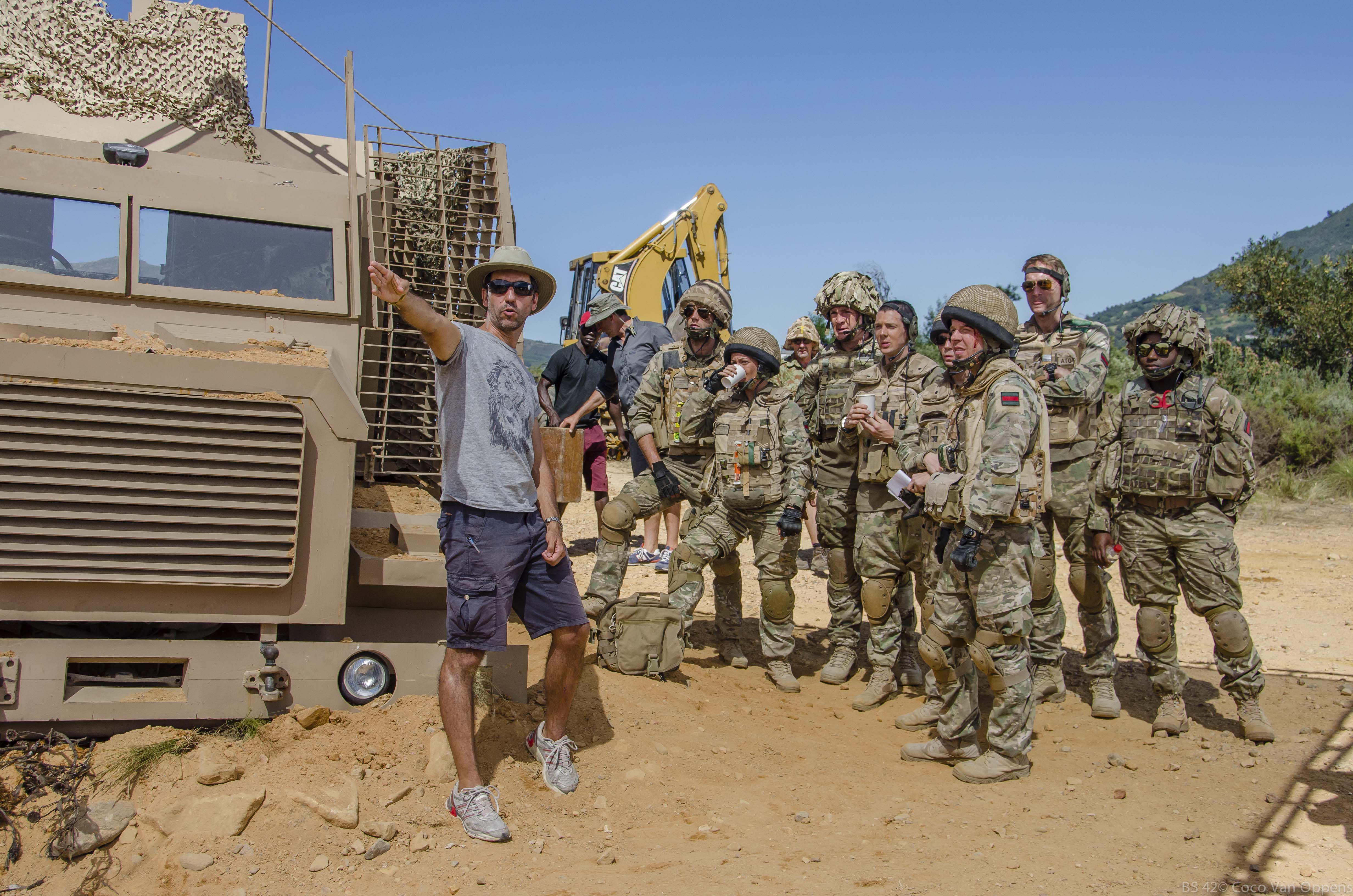 David Sant on the set of Bluestone 42 with the cast.