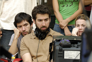 Producer Emanuel Michael, Director Seth Grossman, and Production designer Lee Yaniv on the set of Unison Films' 