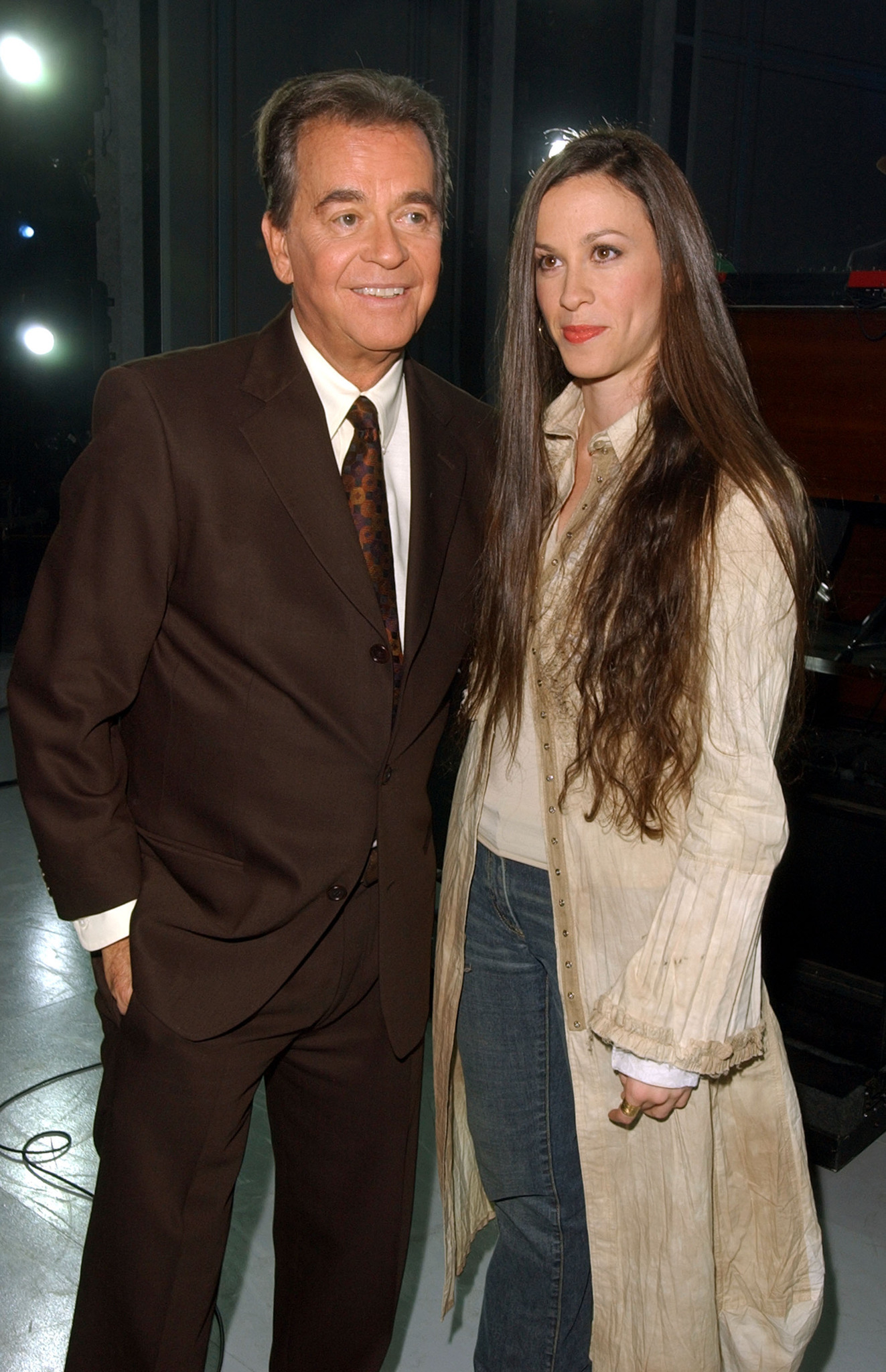 Alanis Morissette and Dick Clark