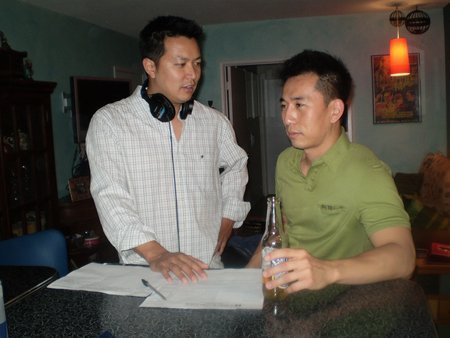 Tom Huang and James Kyson Lee on the set of 