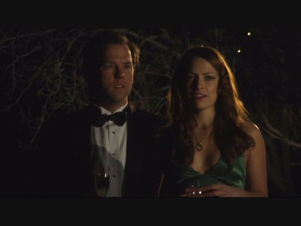 Becca Battoe in little black dress (& heels) Movie Still with Bill Billions