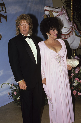 Larry Fortensky and Elizabeth Taylor at the Carousel of Hope Ball held at The Beverly Hilton hotel
