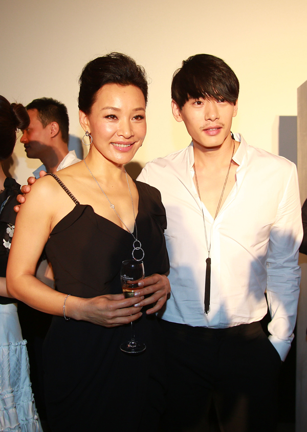 Actor/Director Joan Chen with Teo Yoo at the premier of 