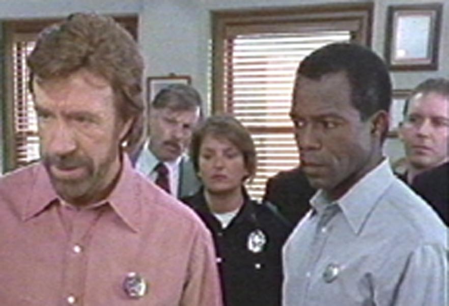 Chuck Norris, LynNita Ellis, and Clarence Gilyard on the set of 