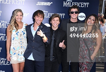 Tyler Case( pictured fourth from the left) and friends attending the world Premiere of Disney's 'Maleficent' at the El Captain Theatre in Hollywood, California on May 28, 2014