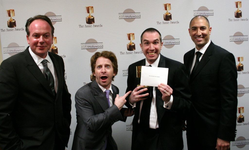Seth Green and Matt Senreich, shocked by their win for best animated short subject, surrounded by presenters Tom McGrath and Danny Jacobs