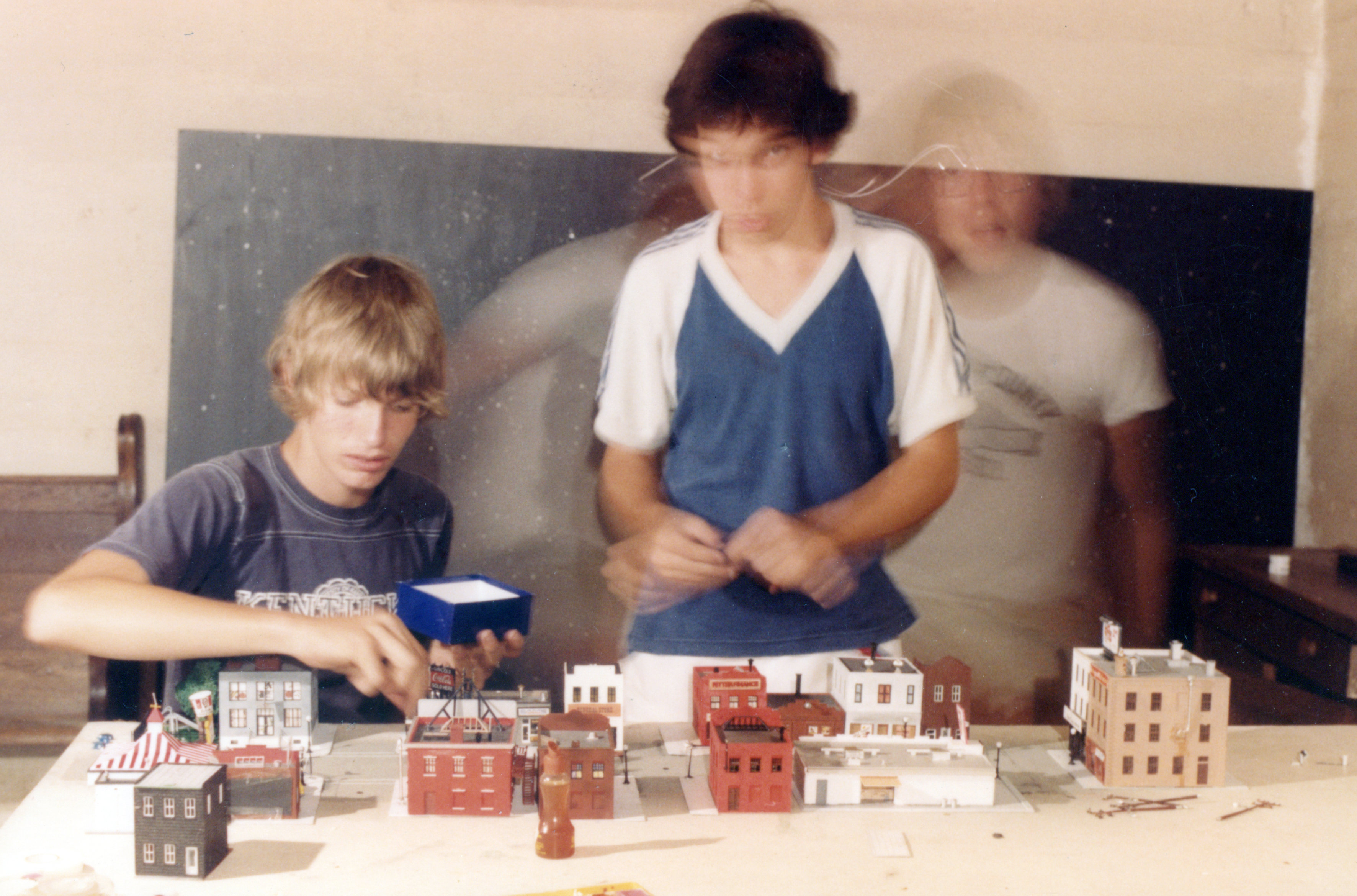 Steve Frazier, Jon Teboe and Dan Frazier build the miniature model city for 