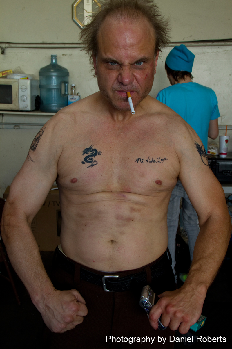 Dennis W, Hall as DEREK ROSS in THE CROSS. A film by The Grinman Brothers. (Fake tattoos - Real bruises)