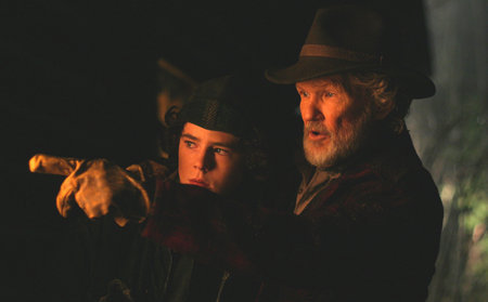 Quebec Bill, (Kris Kristofferson) and Wild Bill, (Charlie McDermott) look into the night in 