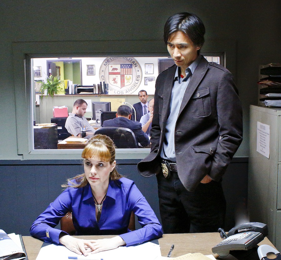 Roy as Detective Lee with Stephanie Erb as Detective Gaines in 
