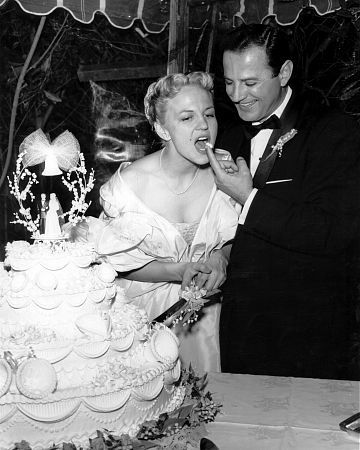 Peggy Lee with husband Brad Dexter on their wedding day January 6, 1953. / **I.V.