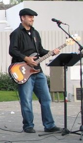 Steve playing his main axe, a 1979 Fender P-bass, summer of 2010.