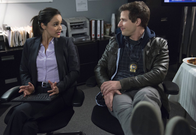 Still of Melissa Fumero and Andy Samberg in Brooklyn Nine-Nine (2013)