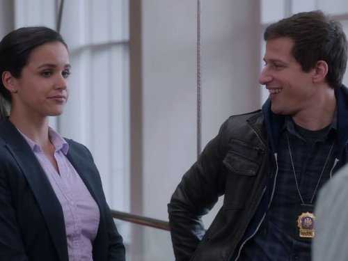 Still of Melissa Fumero and Andy Samberg in Brooklyn Nine-Nine (2013)