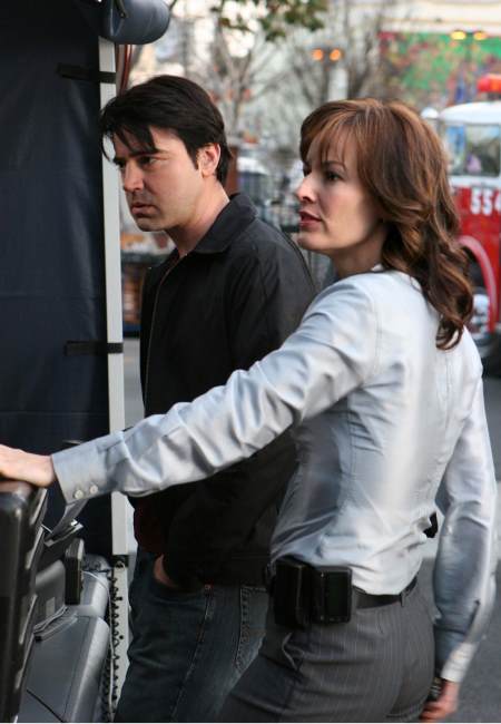 Still of Ron Livingston and Rosemarie DeWitt in Derybininkai (2006)