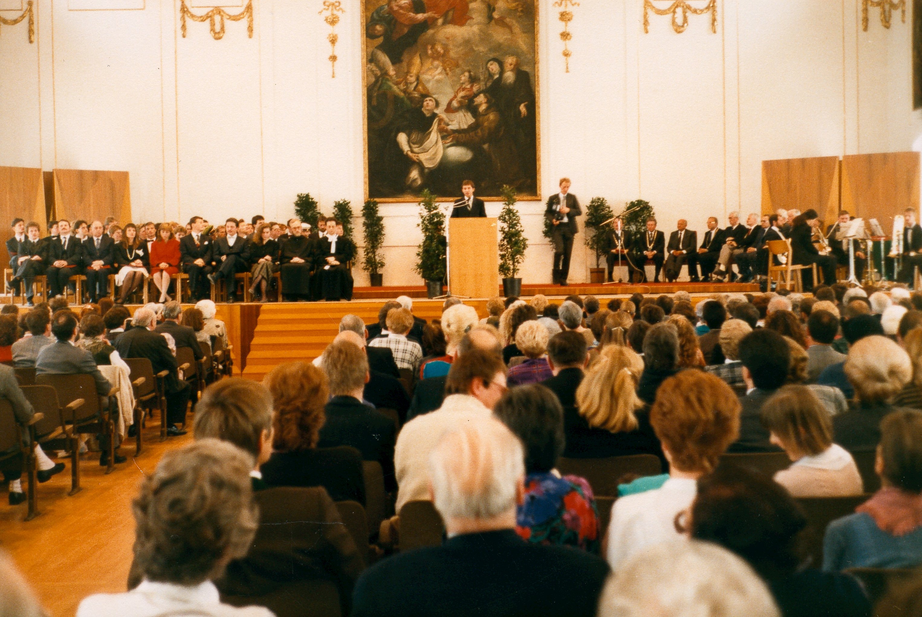 speaking at his graduation ceremony, University of Salzburg