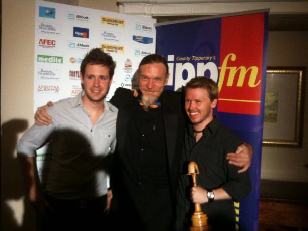 Actor David Moon, Will Nugent (festival director at International Film Festival Ireland) and Tobias Tobbell with award for best First Film (Europe) as producer.