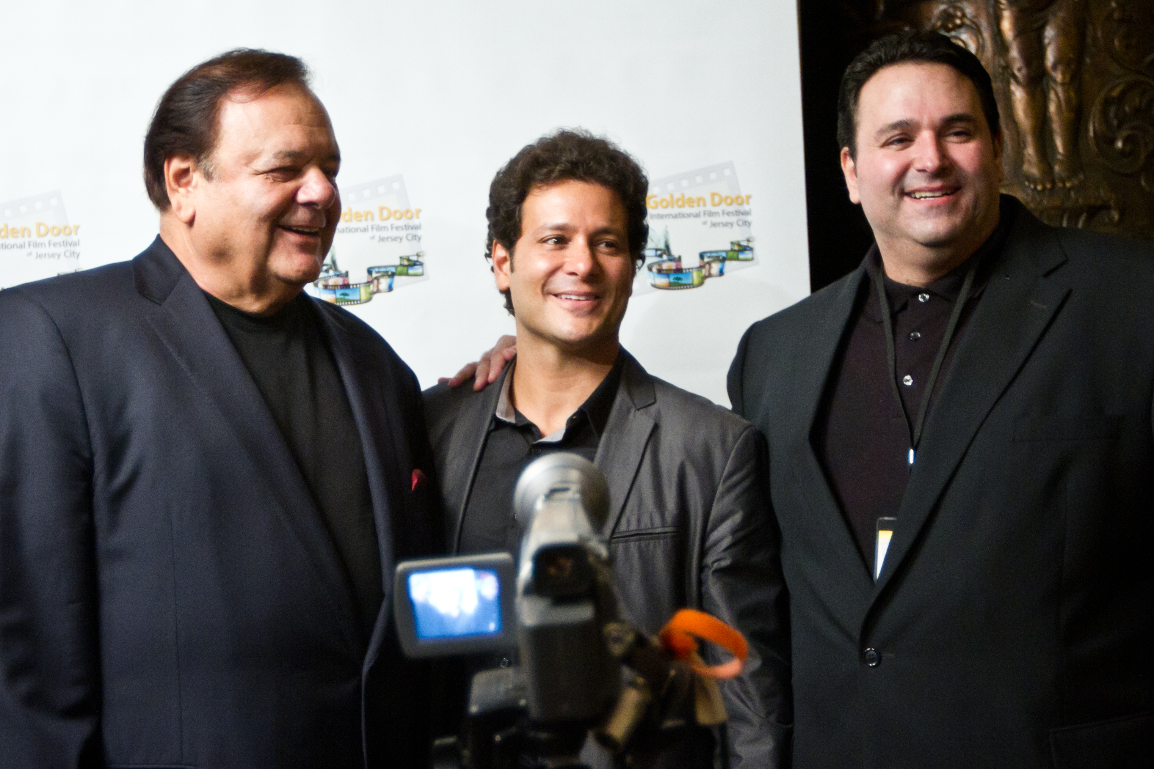 Sam Borowski (R) poses on red carpet w/ Festival Director Bill Sorvino and legendary actor Paul Sorvino (L) at 2011 GOLDEN DOOR INTERNATIONAL FILM FESTIVAL OF JERSEY CITY. Borowski's NIGHT CLUB won 5 awards, including Best Director, Best Feature.