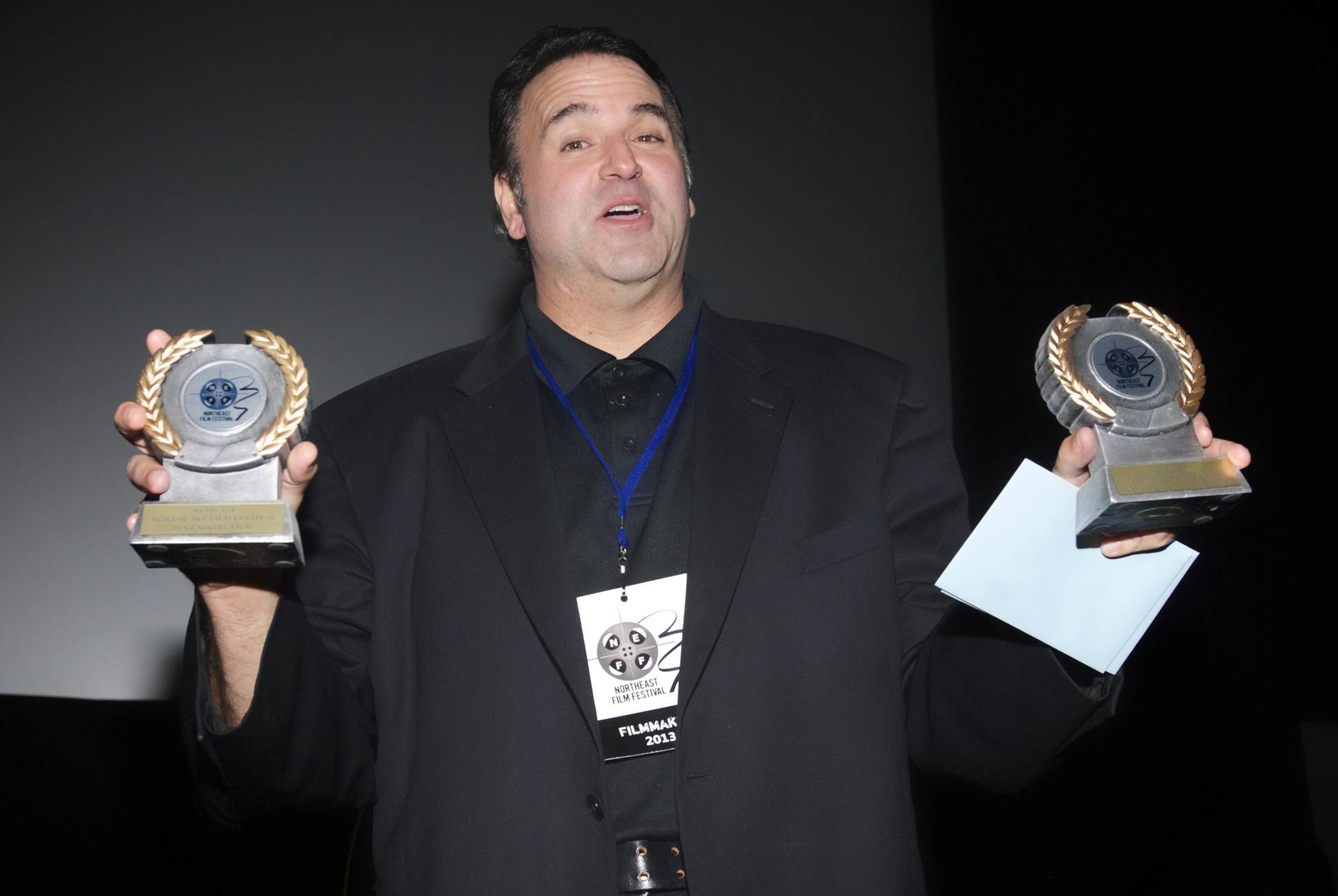Sam Borowski displays the two awards he won at the 2013 Northeast Film Festival for his film, 