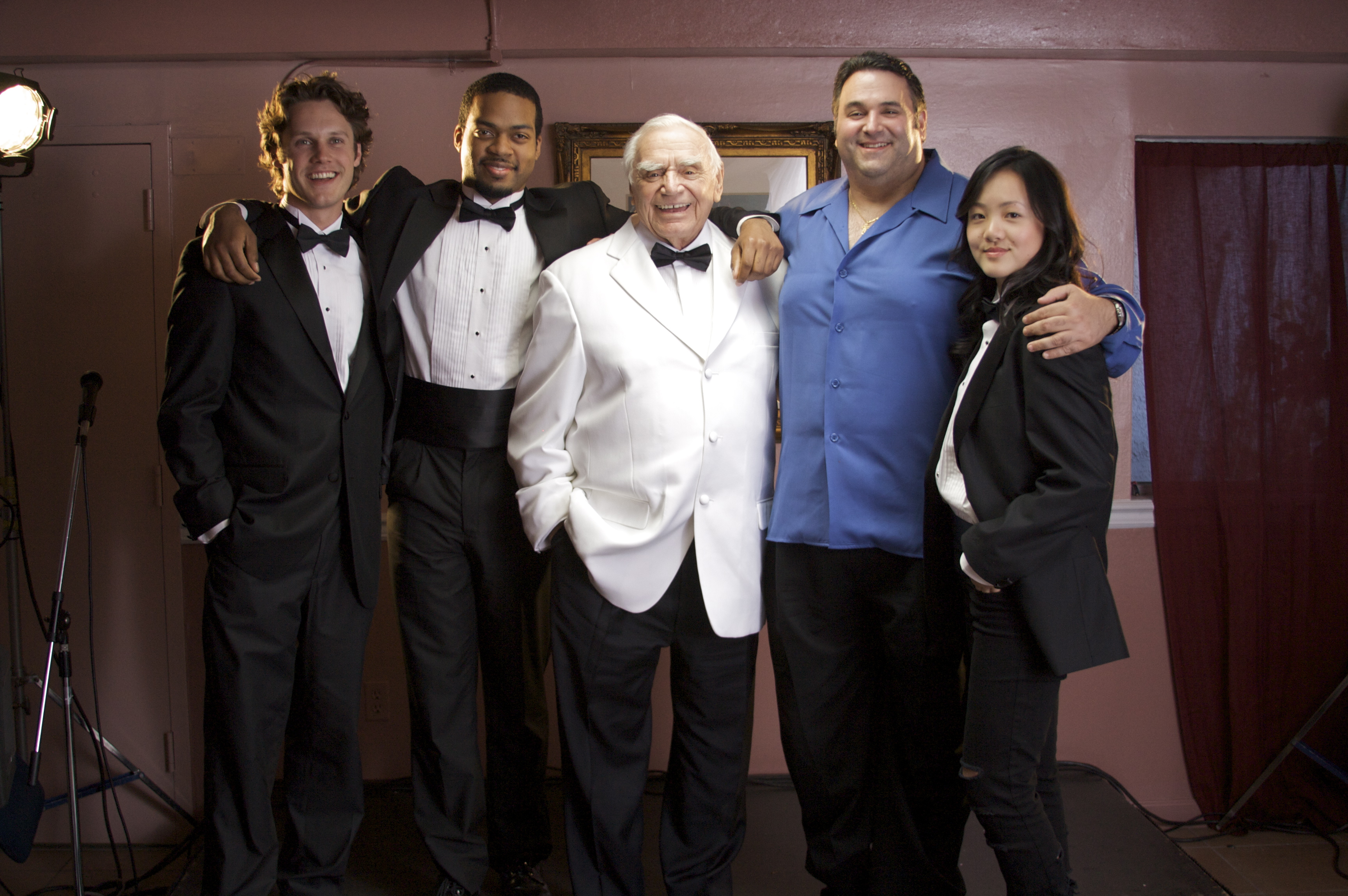 Director/Producer Sam Borowski (in blue) poses for a publicity shot with his cast from NIGHT CLUB (L to R), Zachary Abel, Bryan Williams, Academy Award Winner Ernest Borgnine and Ahney Her (GRAN TORINO).