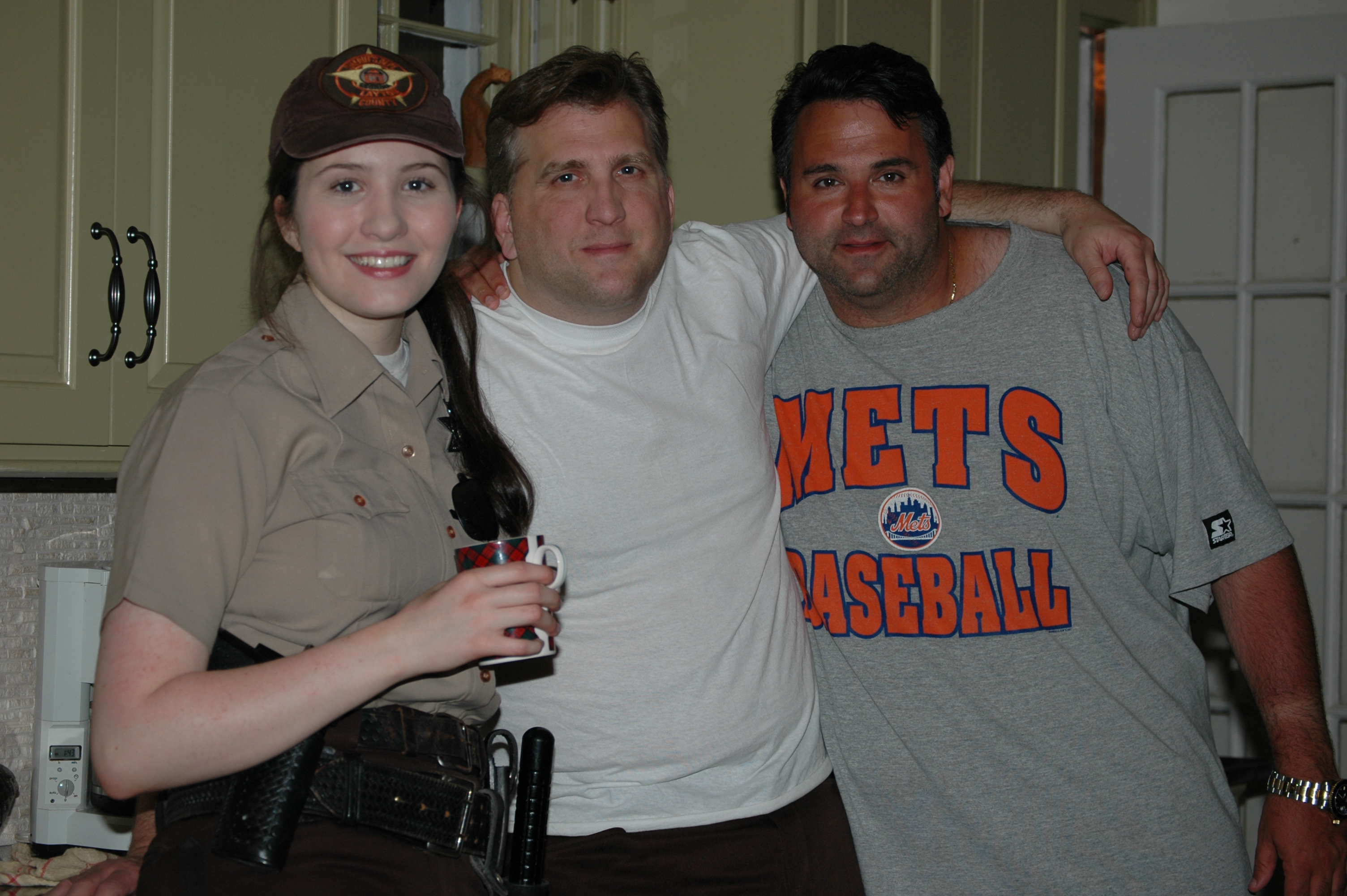 Producer Sam Borowski (r) flanked by actors Robin Anne Phipps (Dee) and Daniel Roebuck (Sherriff Bobby) on the set of REX.