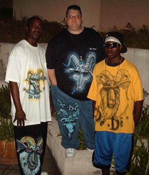 Bubba Da Skitso (center) With Big Moe and J-Woods of Purple Leaf Entertainment. All sporting De Wear designed by Bubba Da Skitso.