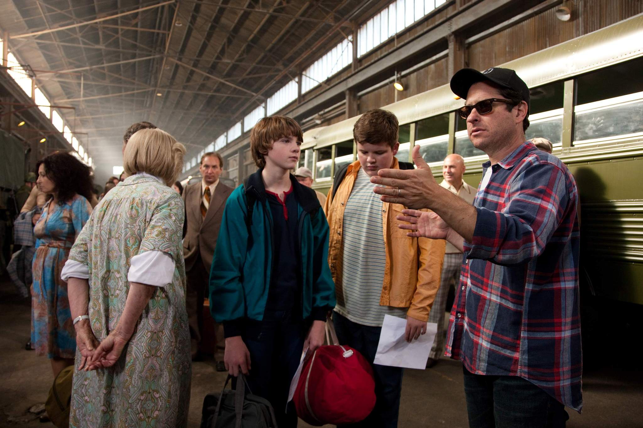 Still of J.J. Abrams, Joel Courtney and Riley Griffiths in Super 8 (2011)