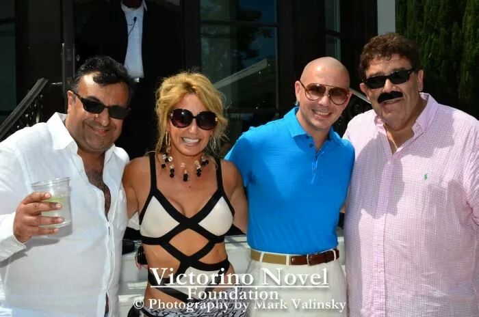CC Perkinson attends a private celebration for Victorino Novel's Foundation with artist, Pitbull.