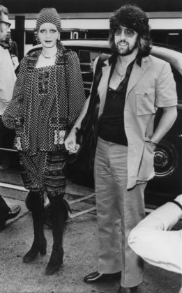 Twiggy with manager-boyfriend Justin de Villeneuve leaving Heathrow airport in London to vacation in Bermuda September 1, 1971