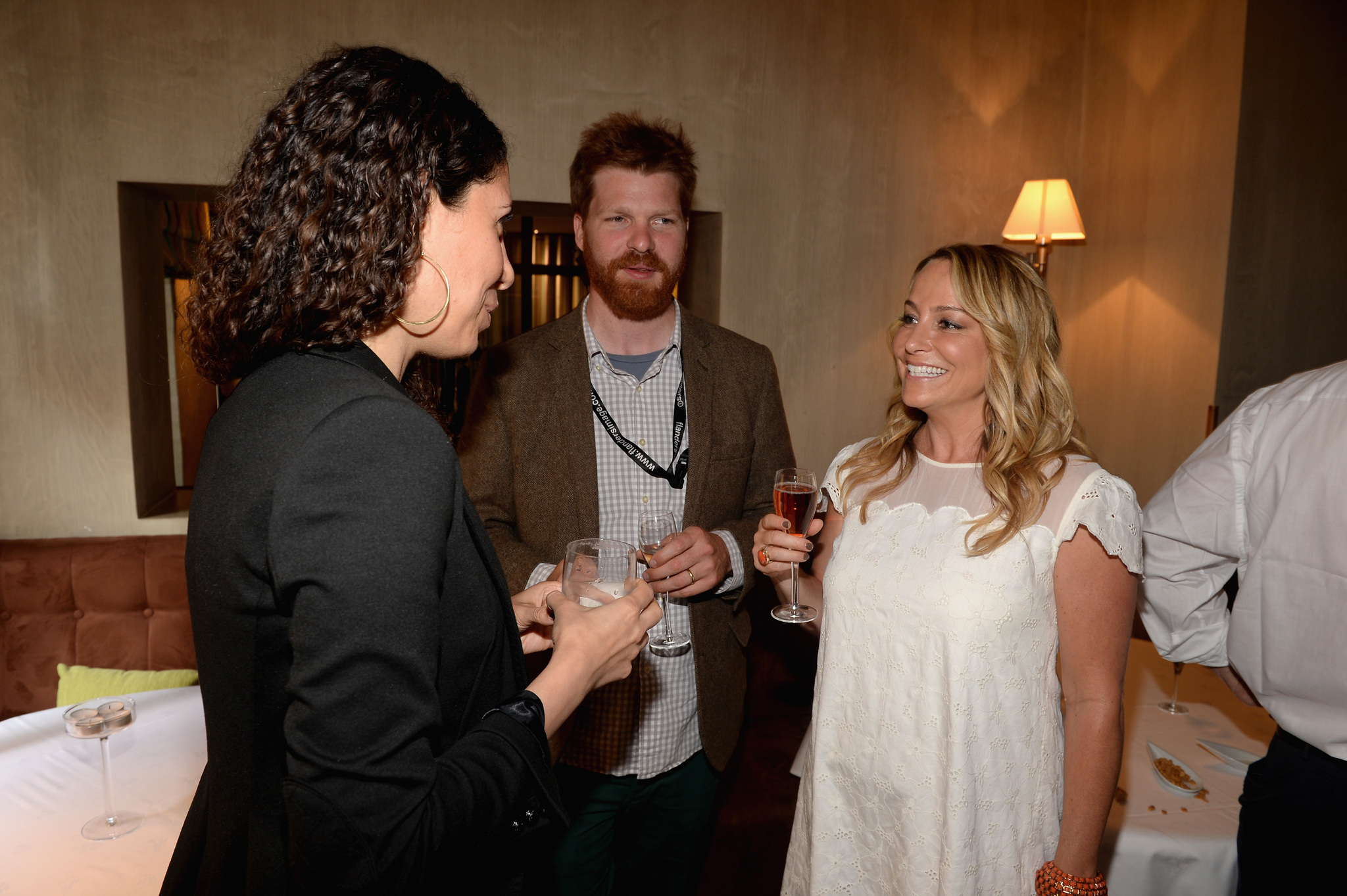 IMDb's Yasmine Hanani, AFI Fest's Lane Kneedler and IMDb's Emily Glassman attends the IMDB's 2013 Cannes Film Festival Dinner Party during the 66th Annual Cannes Film Festival at Restaurant Mantel on May 20, 2013 in Cannes, France.