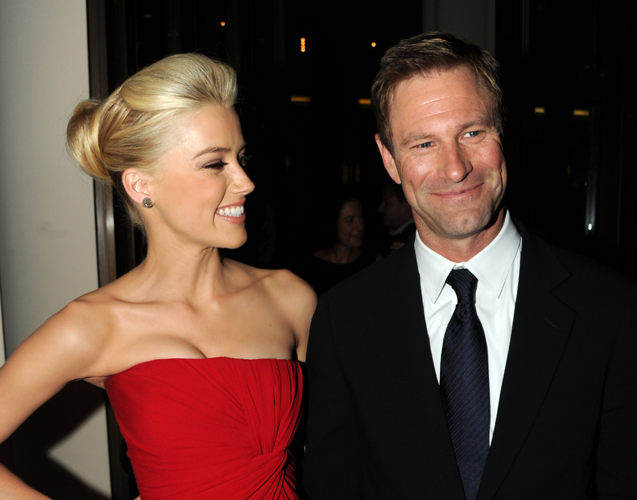 Aaron Eckhart and Amber Heard at event of Romo dienorastis (2011)