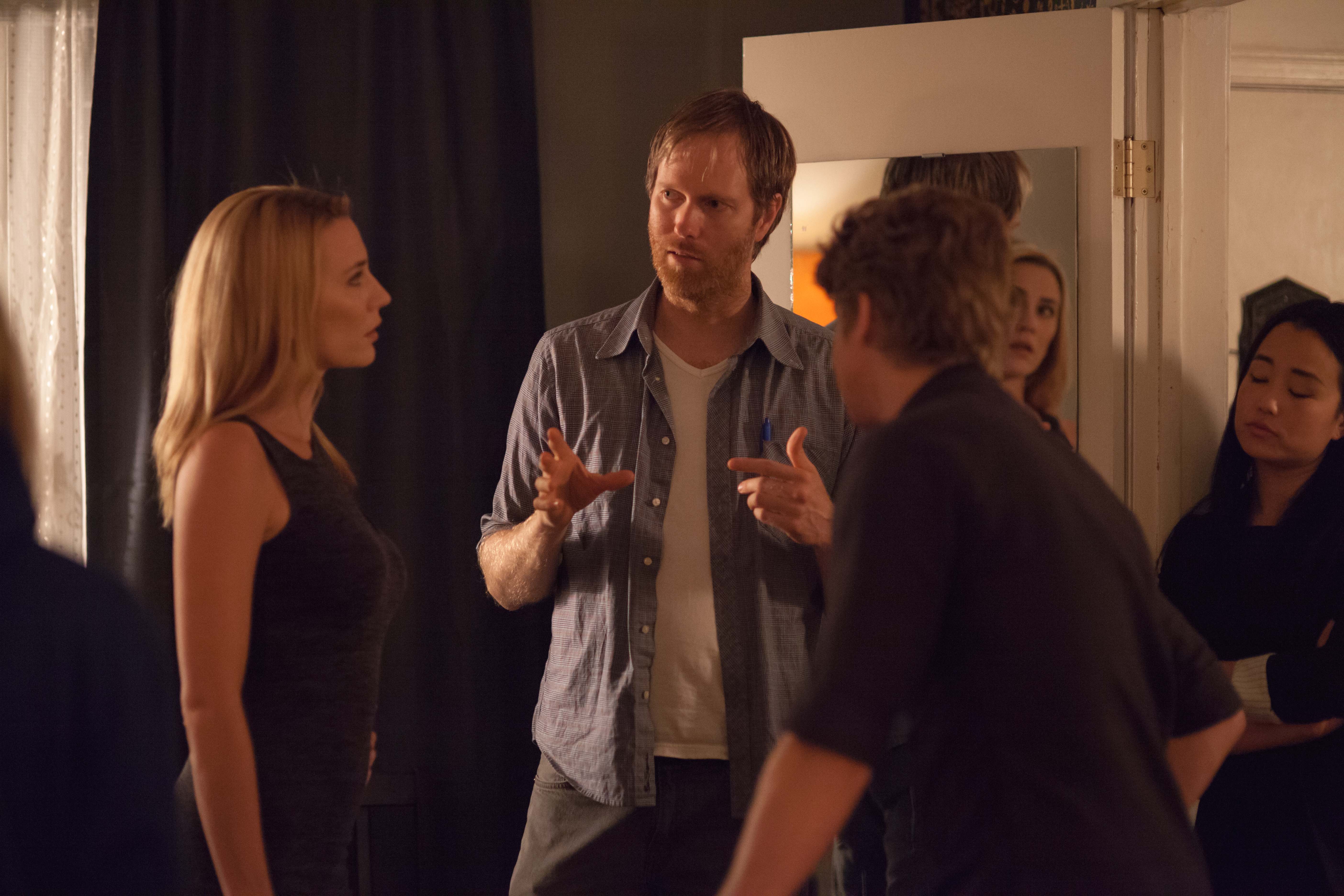 Mark discusses a scene with Andrew Francis and Jessica Harmon