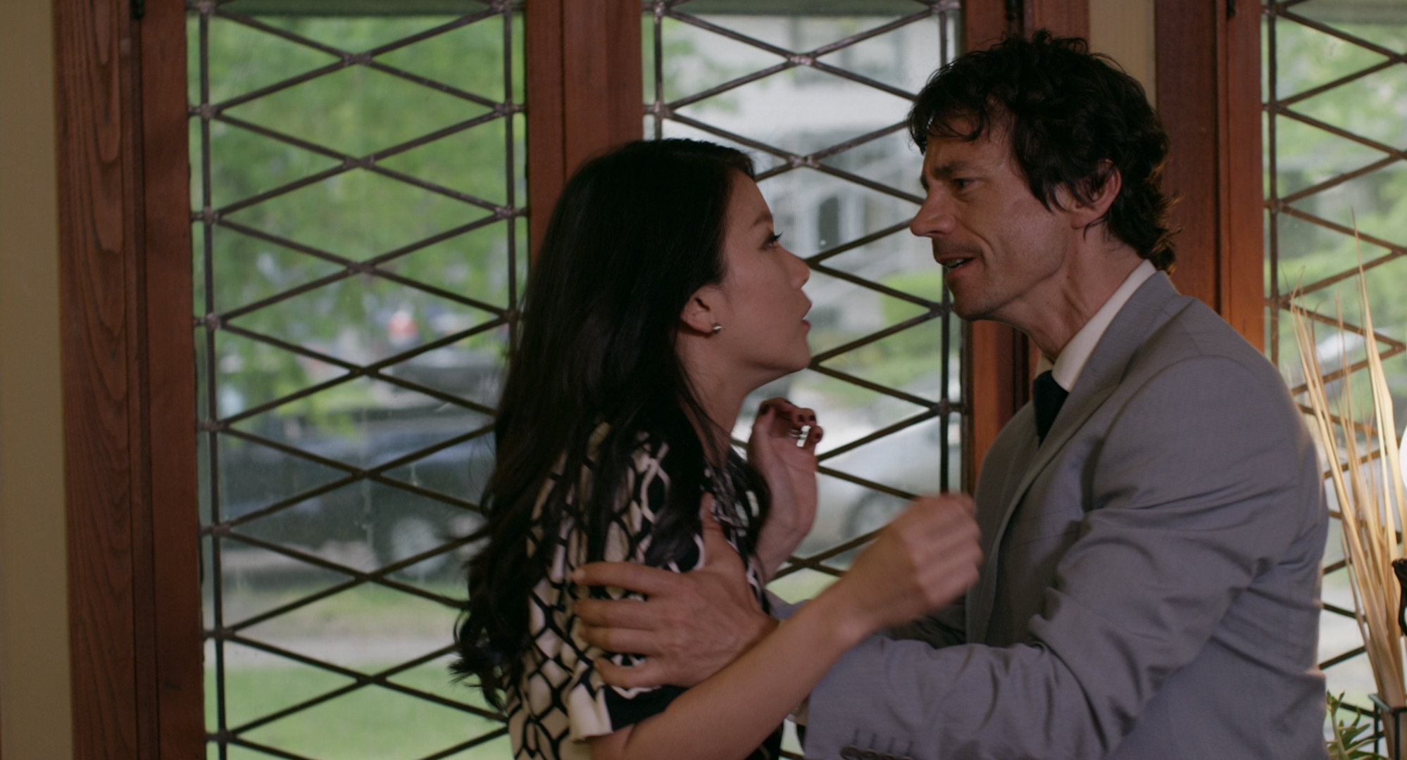 Still of Michael Piccirilli and Pamelyn Chee in Prescient (2015)