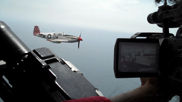 Shooting out the waist gunners window of the Collings Foundations' B24 while recording Vi Cowden Flying in the P51.